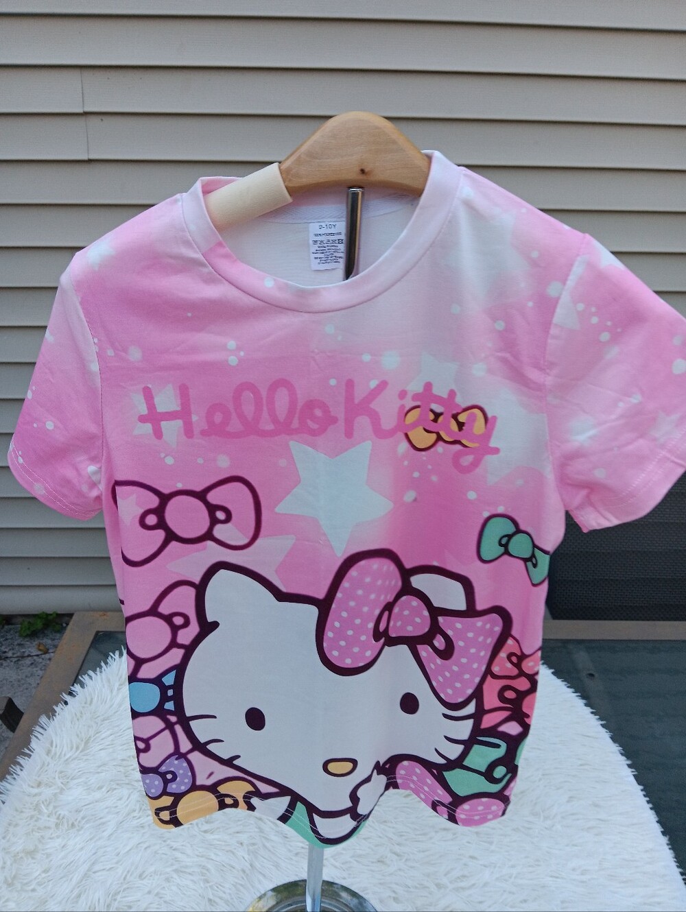 Hello Kitty Pink and White Graphic Tee with Multicolor Bows Size 9/10